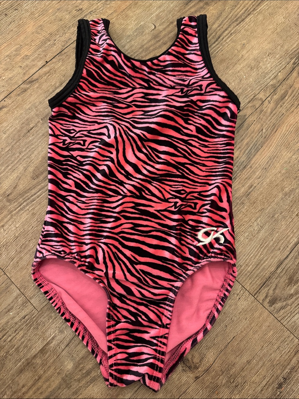GK Pink and Black Zebra-Print Dance Leotard with Logo Accent